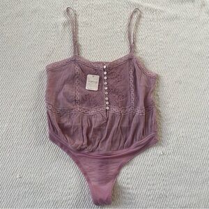 “Still the One” Free People Lace Trim Cotton Bodysuit